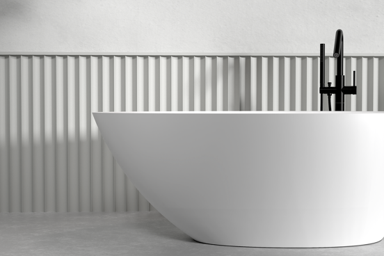 Balmani Colea ovaal vrijstaand bad 160 x 86 cm Solid Surface mat wit met geïntegreerde legplank