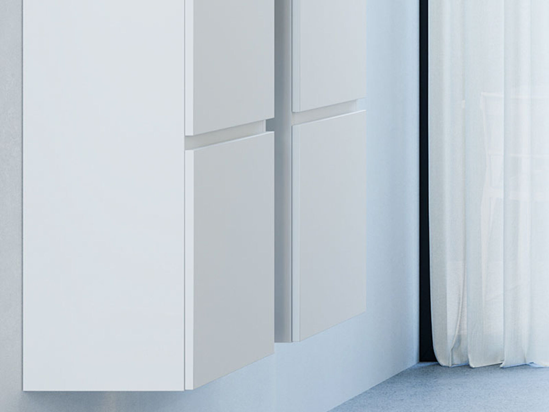 Witte, zwevende badkamerkasten met strakke, minimalistische afwerking.