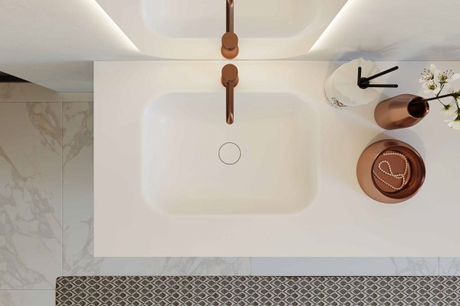 Moderne weiße Waschbeckenplatte mit integriertem Becken und kupferfarbenem Wasserhahn auf Marmorboden.