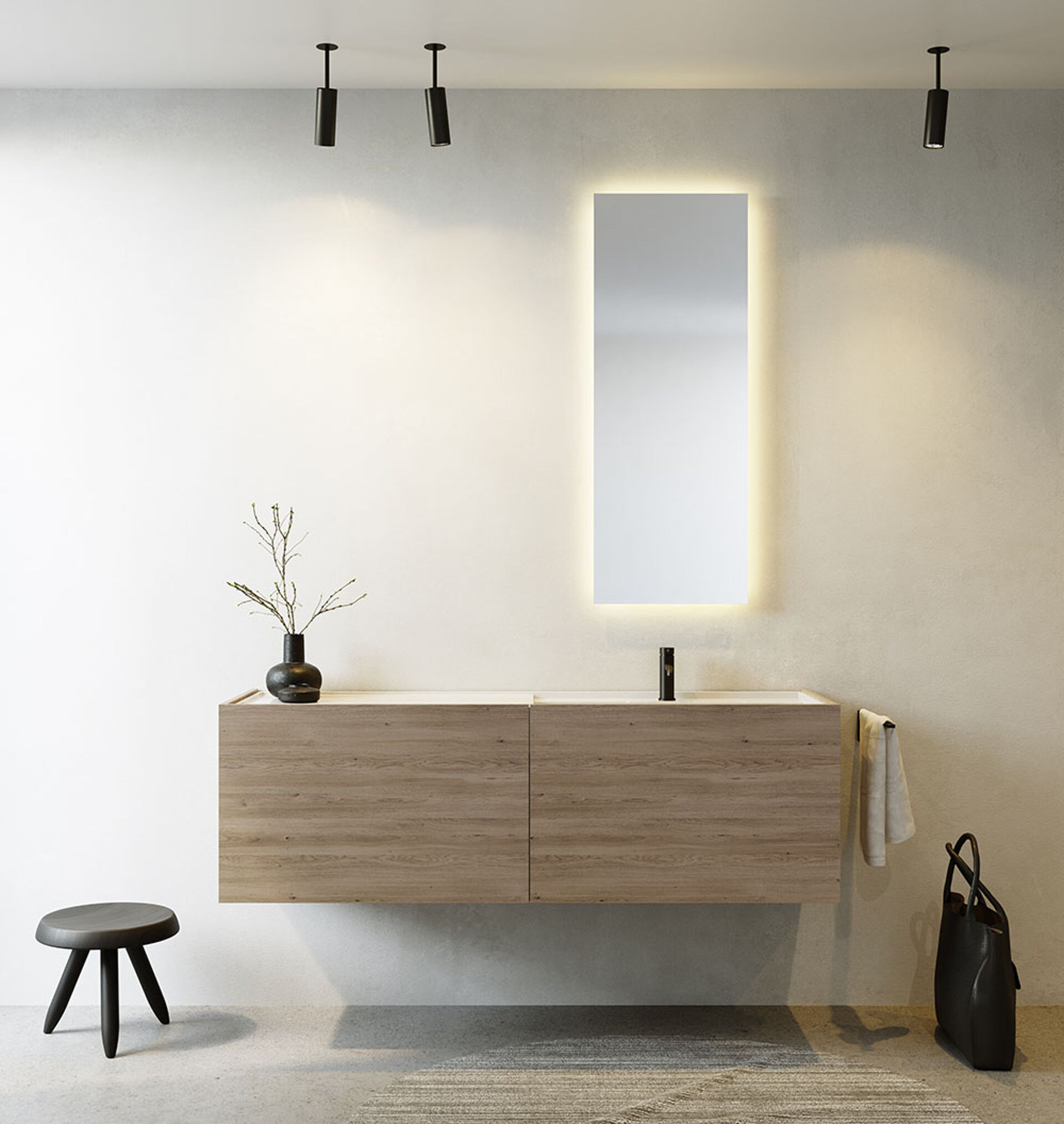 Salle de bain minimaliste avec meuble lavabo en bois, miroir lumineux et décoration épurée.