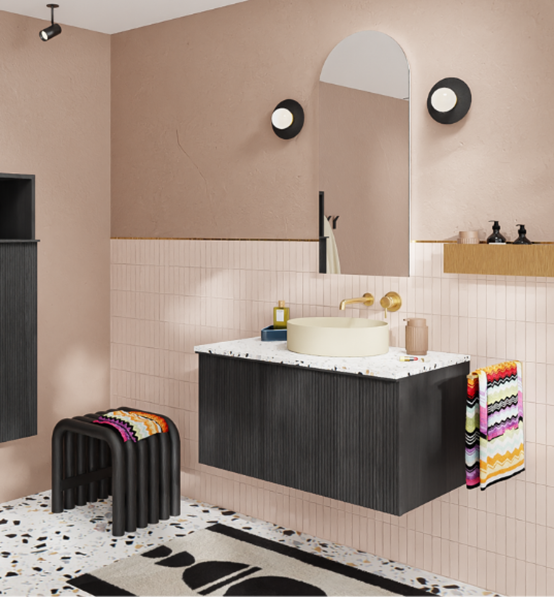 Salle de bain moderne avec un lavabo noir, un lavabo rond, des serviettes colorées et un tabouret