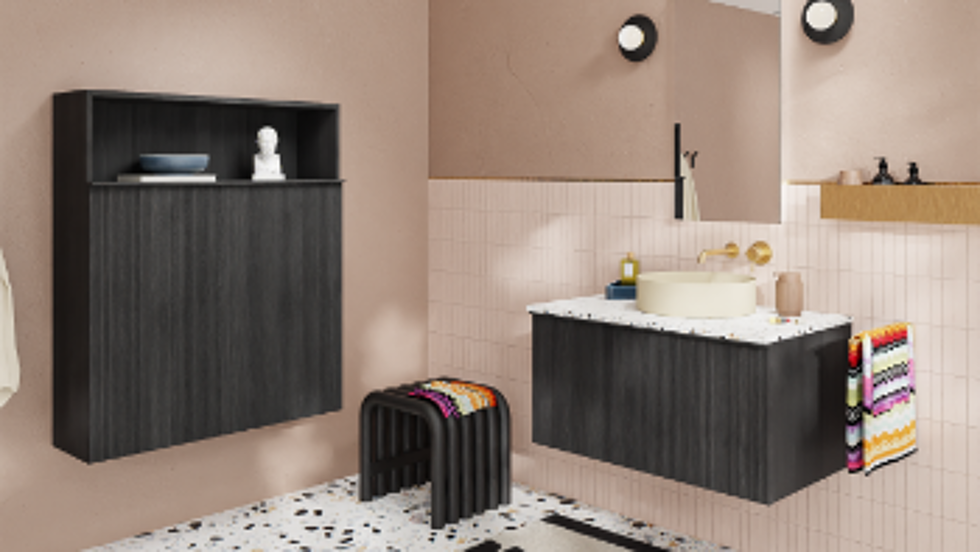 Meuble de salle de bain noir avec plan terrazzo et vasque dans une salle de bain tendance rose